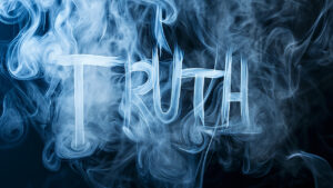 Truth over a smoke background